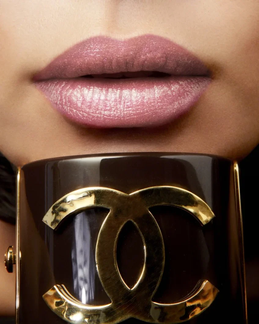 Premium Chanel 31 le rouge lipstick glass case reflecting a sophisticated lifestyle