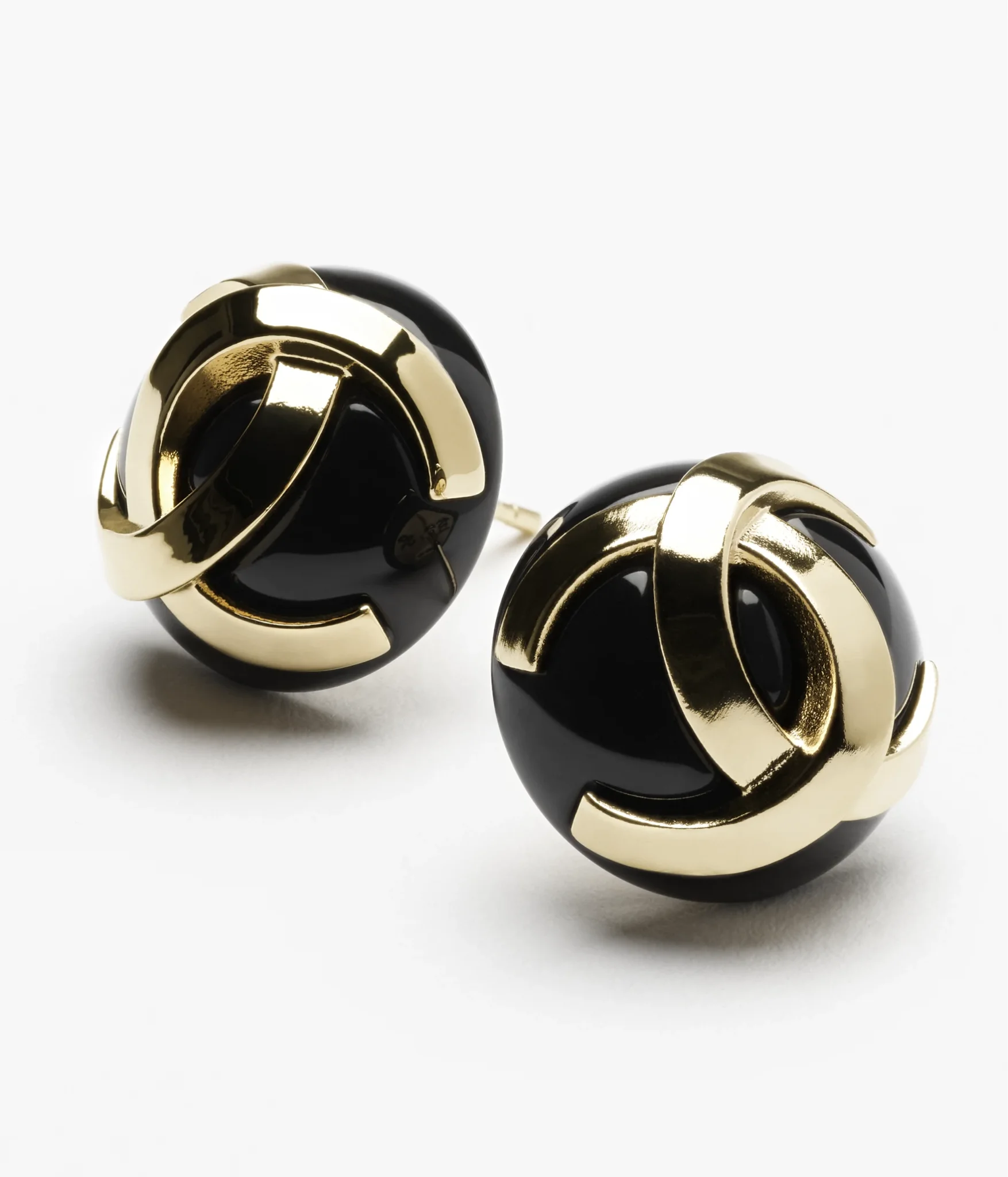 Chanel CC logo earrings in golden and black enamel finish stud style
