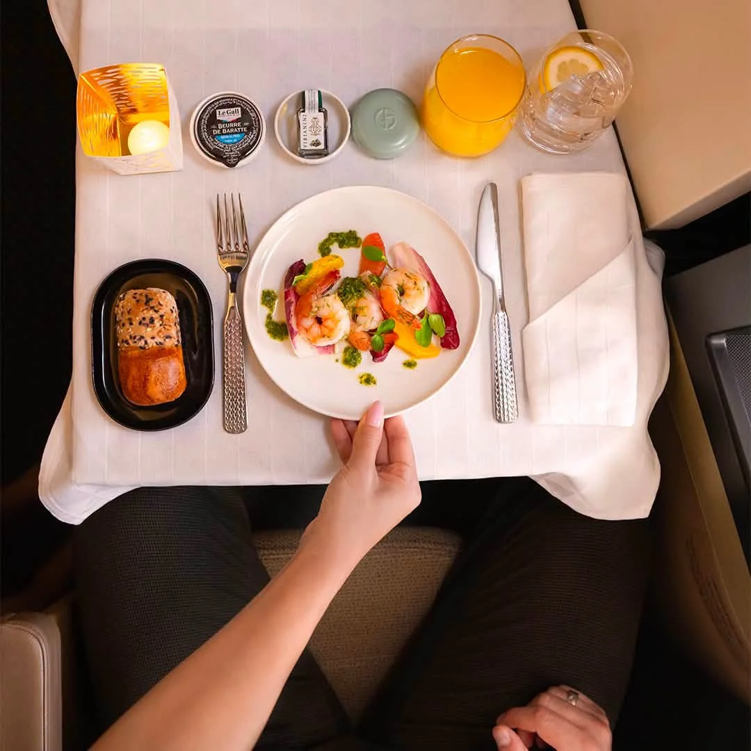 Fine dining and in-flight luxury service on Etihad Airways Europe business class deals