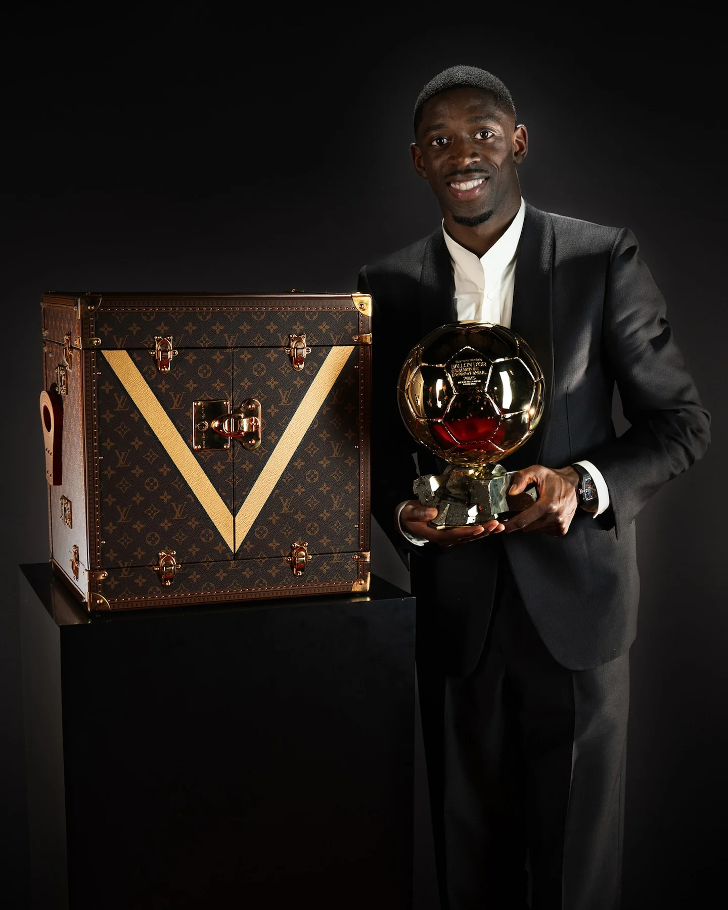 Exquisite crafting details on a bespoke Louis Vuitton case for trophies featuring the monogram pattern