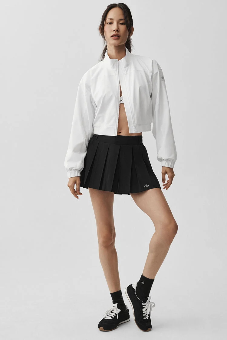 Alo Yoga activewear set featuring Clubhouse Jacket and Leggings
