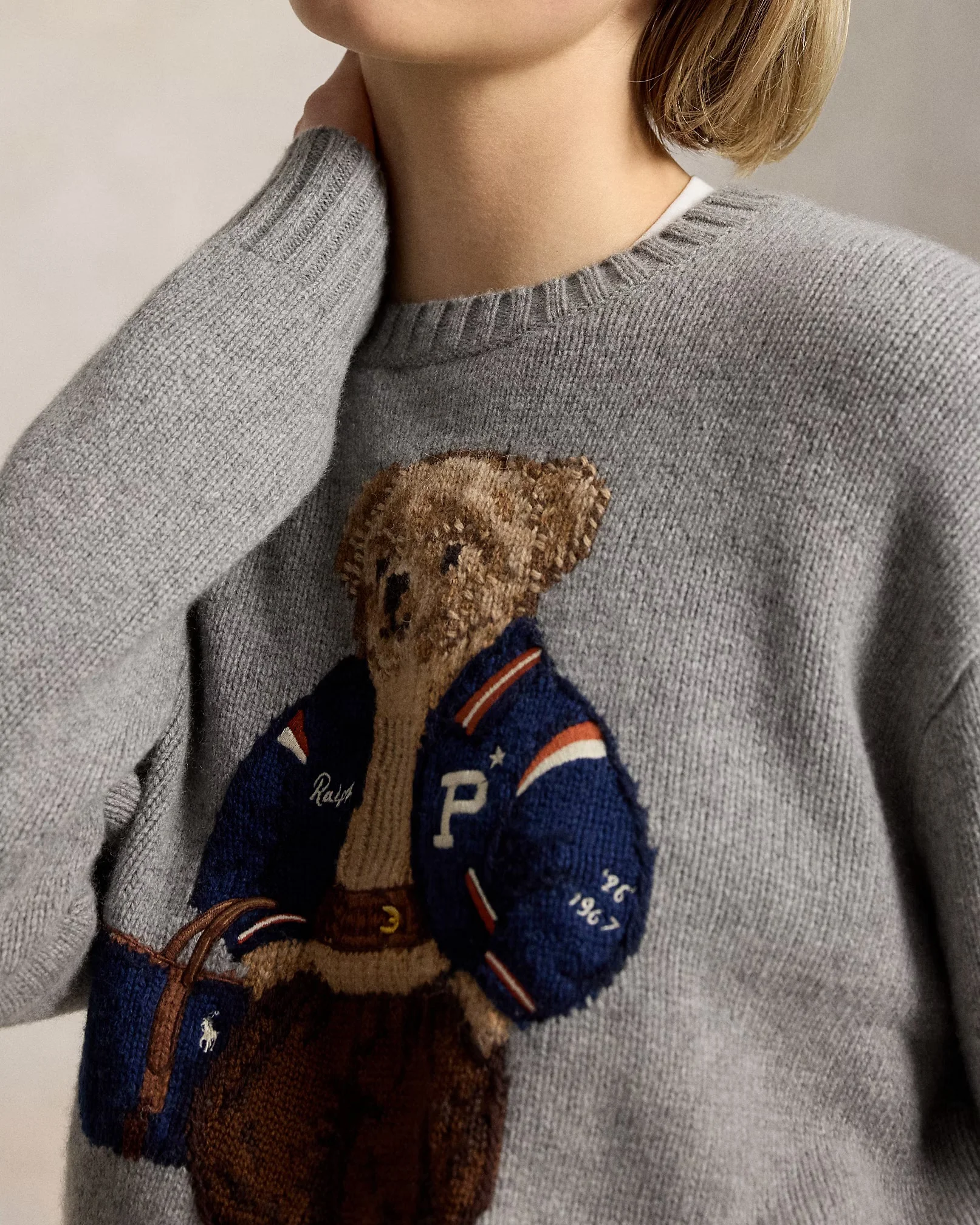 Classic Polo Ralph Lauren cable-knit sweater and Oxford cotton shirt in preppy style