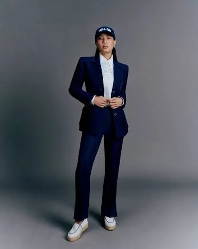 Handwoven indigo-dyed cotton suit jacket from Don Koi Sakon Nakhon in the Thai athletic uniform